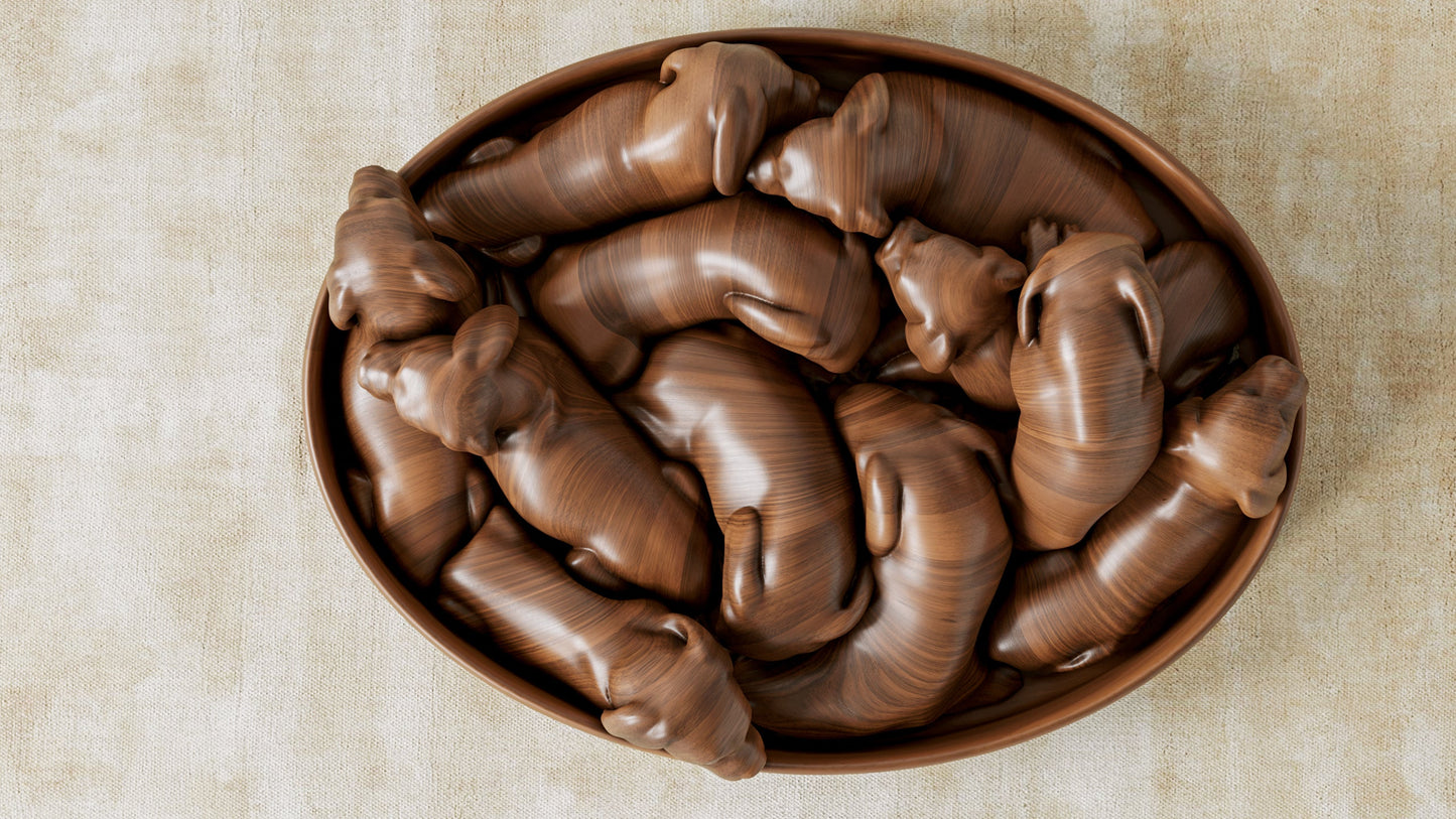 Walnut snuggled puppies puzzle. Life size